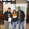 Mauro, Ivanna y Benjamín recibiendo las llaves de su vivienda
